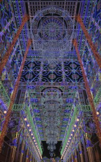 Spain, Valencia Province, Valencia, Street illuminated for Las Fallas festival. 
Photo Hugh Rooney
