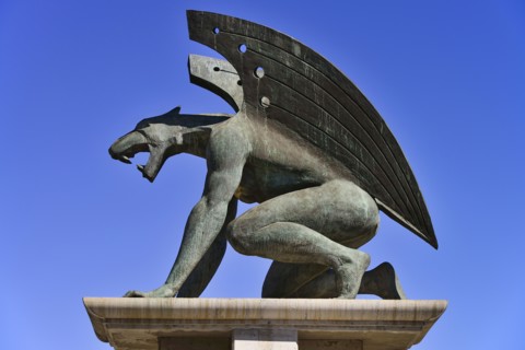 Spain, Valencia Province, Valencia, Puente del Reino  A gargoyle at the entrance to the bridge  Puente del Reino is one of many bridges over the former Rio Turia which now serves as a park as the rive...