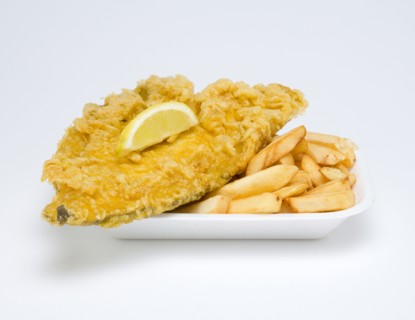 Food, Cooked, Fish, A portion of battered deep fried plaice with a slice of lemon and potato chips.