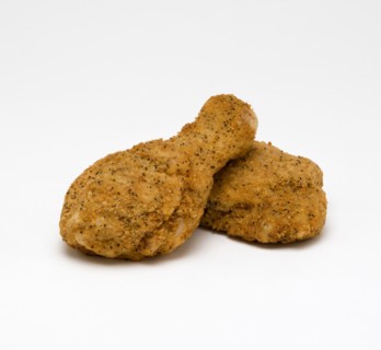 Food, Cooked, Poultry, Two breaded chicken drumsticks on a white background.