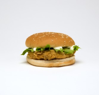 Food, Cooked, Poultry; Chicken breast fillet burger with lettuce and mayonaise in a bun on a white background.