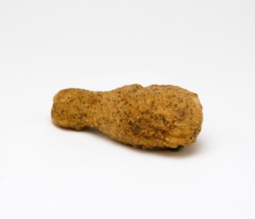 Food, Cooked, Poultry, Single breaded chicken drumstick on a white background.