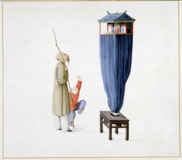 Homme à l'intérieur d'un théâtre-marionnette