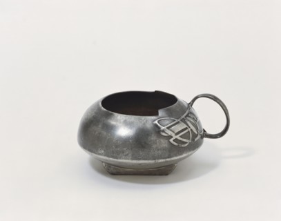 Pewter Tudric Milk Jug, by Archibald Knox. London, England, early 20th century