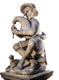 Boy playing the bagpipes, by Caius Gabriel Cibber. England, late 17th century