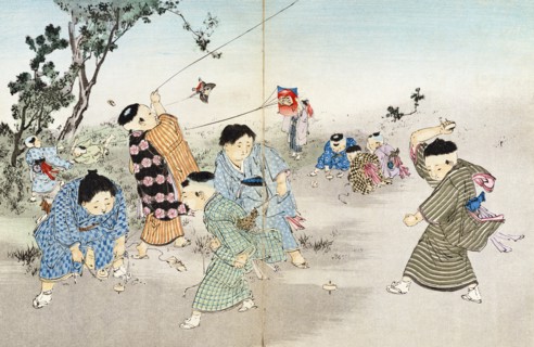 Boys playing with spinning tops & flying kites. Tokyo, Japan, 20th century