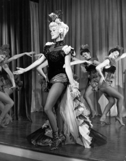 Film still of Jayne Mansfield on stage in The Sheriff of Fractured Jaw
