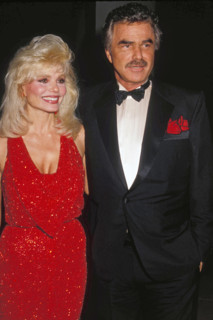 BURT REYNOLDS with LONI ANDERSON at the Golden Globe Awards in 1991. (Credit Image: © Globe